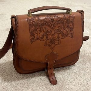 Brand new.  Beutiful hand made cross bag leather